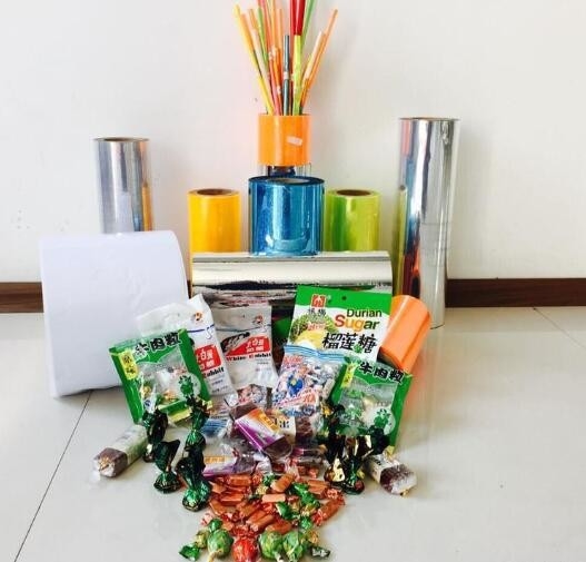 Film kemasan PVC warna-warni untuk dekorasi dan pencetakan Laminated, PVC film twist kaku